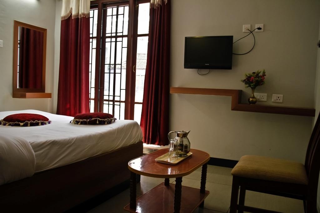 Apple Residency Hotel