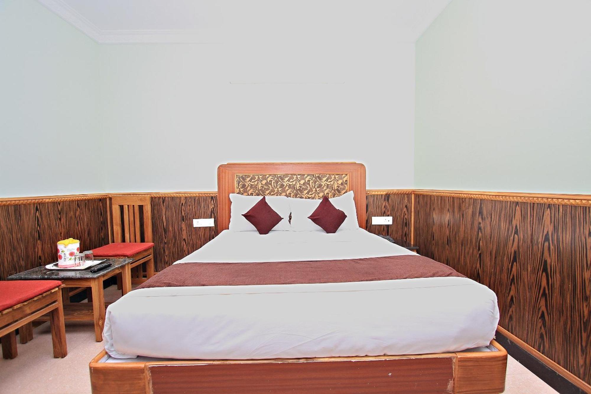 Hotel Capital O 8709 Rain Forest